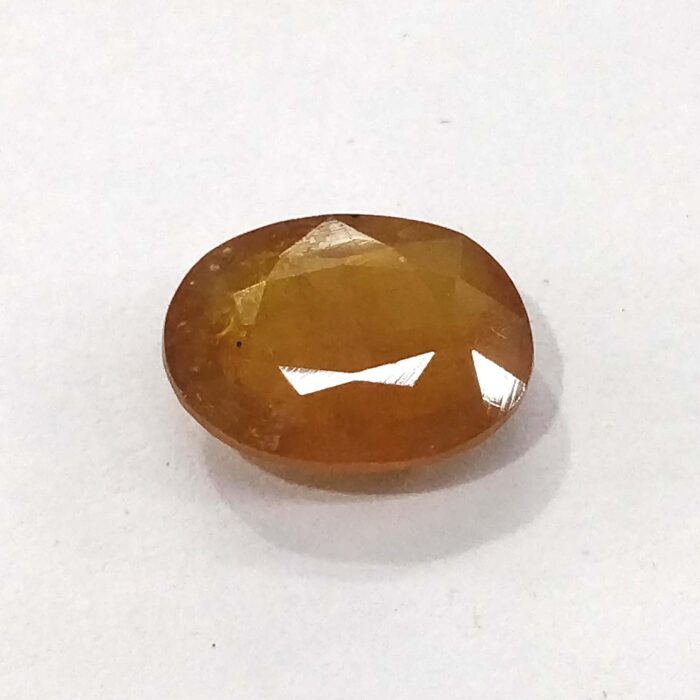 bkk1_f7684e1d-8c92-46b5-ab95-ce2118459bf6 5.58 ct / 6.19 Ratti Pukhraj | Yellow Sapphire with Certificate Oval Cut - Image 1