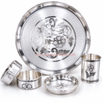 The 925 Hallmarked Silver Thali Set (1100 gm) is a premium handcrafted collection made from 92.50% pure sterling silver.