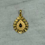 bk gold pendant